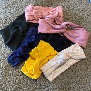 Set of seven solid color bows